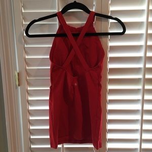 Red Kiragrace cross back high neck top. Size XS.
